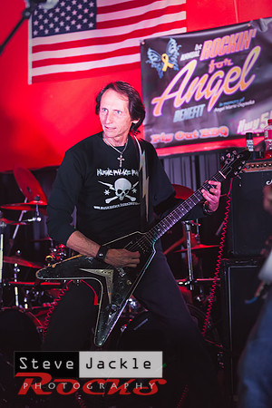 Guitarist Keith Stacy flying the V guitar.