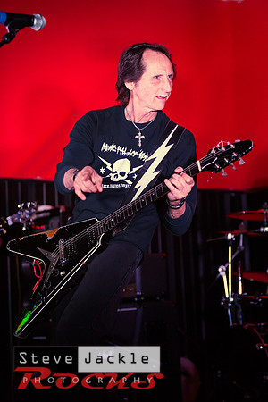 Guitarist Keith Stacy flying the V guitar.