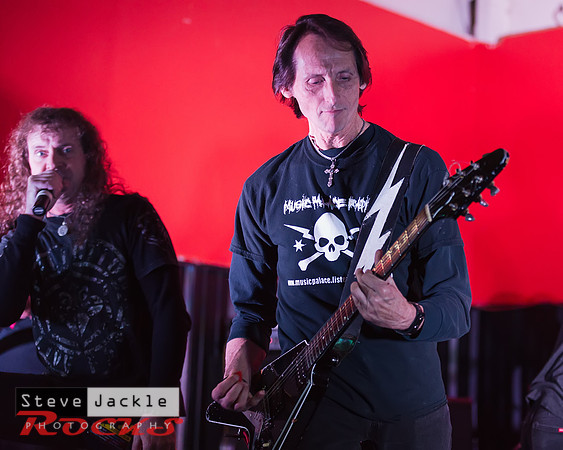 Guitarist Keith Stacy flying the V guitar.