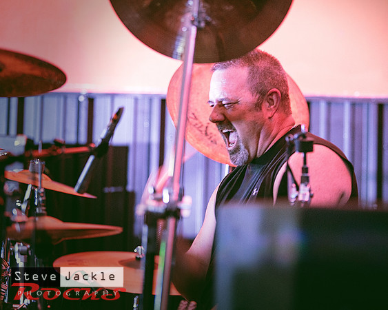 Neal Dennis on drums