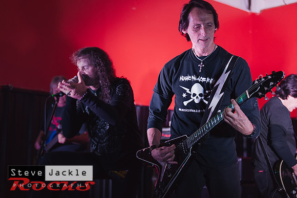 Guitarist Keith Stacy flying the V guitar.
