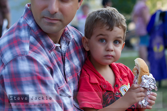 The joy of eating a hotdog with dad.