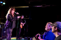 Stacey Winn:  vocals pointing out  a photographer in the crowd.