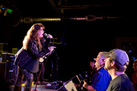 Stacey Winn:  vocals pointing out  a photographer in the crowd.